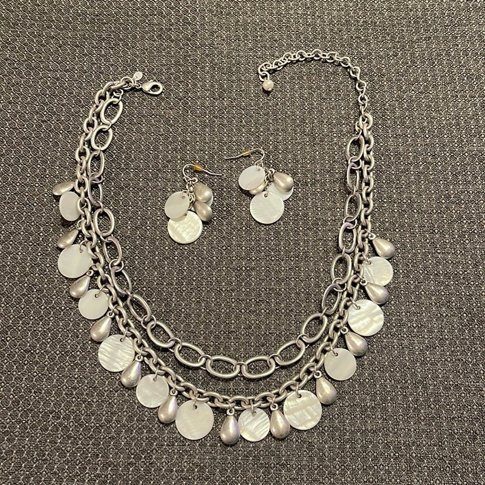Cute necklace with matching earrings.